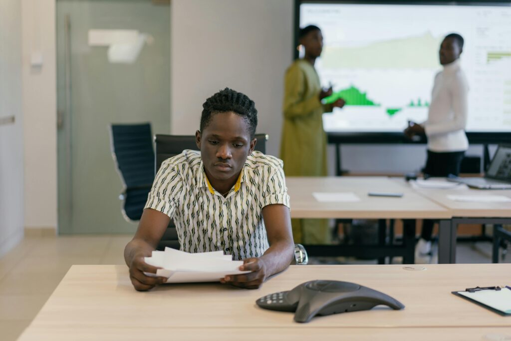 Learning Tech in Lagos: What Nobody Tells Beginners
Business professionals analyzing data in a contemporary office environment.